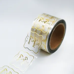 Custom LOGO Printing Vinyl Roll Transparent Labels Clear Gold Foil Eyelash Private Packaging Labels Stickers