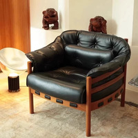 Fauteuil rétro JP en bois massif avec coussin capitonné en cuir vert, dossier en forme de baril, pour salon ou hôtel