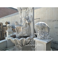 Décor de jardin extérieur luxe marbre blanc granit chérubin et tête de lion Statues mur fontaine d'eau prix