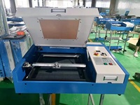 Petite machine de gravure laser bon marché pour logo 3040 4030 40w 50w CO2 machine de découpe laser cnc routeur mini découpeur laser
