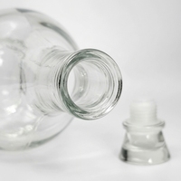 Bouteille de brandy en verre cristallin de 700 ml en gros d'usine avec bouchon en plastique, bouteille de liqueur, whisky, vodka, spiritueux personnalisée