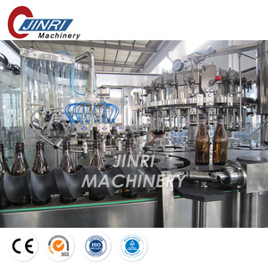 Machine trois en un pour le rinçage, le remplissage et le capsulage de boissons gazeuses dans des bouteilles en verre - Product Image 4