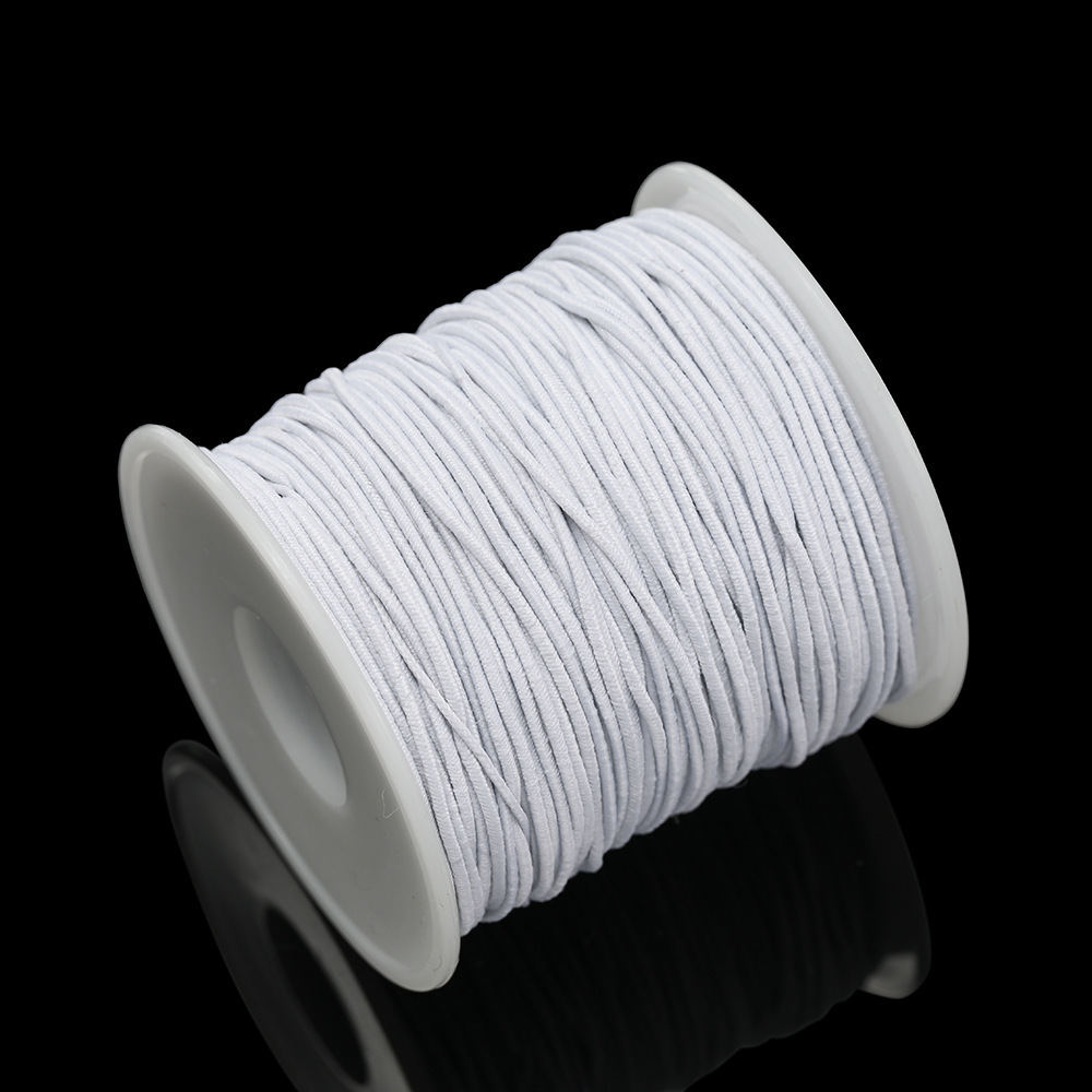 Fil élastique filé à âme blanche