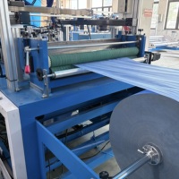 Machine de production automatique de bavoirs et de tampons dentaires non tissés à haute productivité avec PLC et moteur