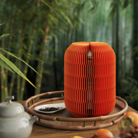 Solutions innovantes d'économie d'espace pour meubles en nid d'abeille et service de thé de lanternes en papier magnétiques pour des décorations de fête à la maison élégantes