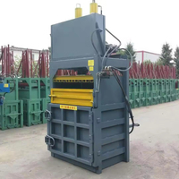 Bouteilles en PET/ferraille de coton/boîtes en aluminium/carton/presse à foin presse à balles hydraulique verticale Machine à emballer le plastique 300kg