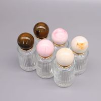 Flacon de parfum transparent côtelé de 30 ml avec bouchon en résine