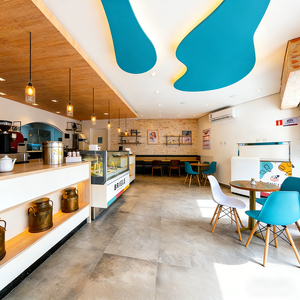 Airy Luxe Bakery & Coffee Market Stall Featuring Glass Display Case, Open Tiered Shelving, and Integrated Warm Lighting - Product Image 6