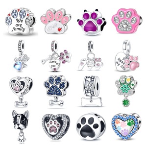 <b>Cute</b> cartoon paw print pendant, made of white brass, from a pet lover's jewelry collection - Product Image 1