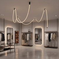 Lustre moderne flexible à LED Seeky, luminaire suspendu long et réglable pour plafonds hauts et escaliers