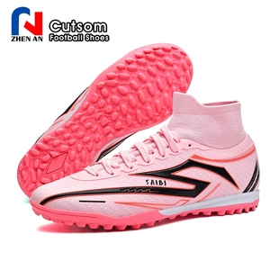 Venta al por mayor de fábrica: Zapatillas de fútbol personalizadas transpirables de caña alta TF con tacos, ideales para entrenamiento y partido, esenciales para aficionados. - Product Image 4