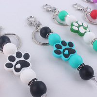 Breloque en silicone en forme de patte de chien en gros, accessoires pour sac à main, pour cadeau