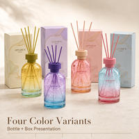 Bouteilles diffuseuses en verre coloré avec bouchons assortis, bâtonnets diffuseurs et boîtes d'emballage