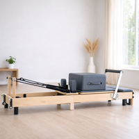 Machine de Pilates pliable en bois d'érable à prix d'usine pour exercices de studio de yoga