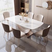 Table à manger extensible en acier inoxydable de style italien ensemble de chaises Design moderne 6 places légères de luxe prêtes pour les mariages de petite taille
