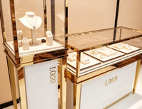 Vitrine à bijoux en acier inoxydable de luxe avec éclairage LED, comptoir d'exposition pour bijouterie, mobilier de magasin, aménagement personnalisé pour salle d'exposition