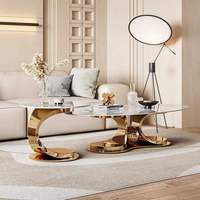 Table basse ovale de luxe avec plateau en marbre et base en acier inoxydable doré, meubles de salon, table à thé