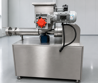 Ligne de production moderne et automatique d'extrusion de pâtes pour la fabrication industrielle de pâtes courtes et de produits alimentaires.
