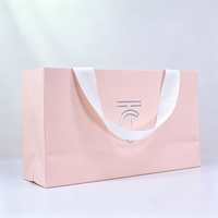 Fabricants de sacs en papier cosmétiques roses de luxe personnalisés avec logo imprimé pour emballages de shampooings et lotions, vente en gros