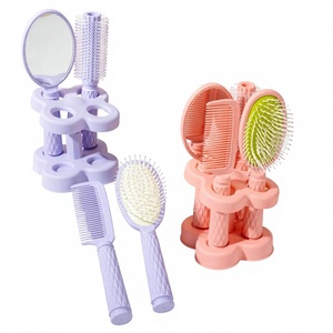 Juego de peines de espejo de cuatro piezas con base, peine de aire de alta gama, peine de cerdas de alto valor, peine especial para el cuidado del cabello femenino, peine para dar volumen - Product Image 1