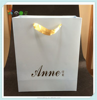 Sacs en papier imprimés de magasin de marque personnalisés en usine et vos propres sacs en papier à provisions en carton avec logo et sacs-cadeaux
