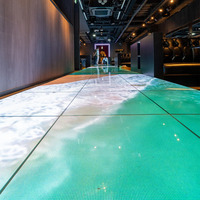 Unilumin Interaktiver LED-Tanzboden-Bildschirm P2.97mm Schnellmontage Belastbare Bodenfliese LED-Panel 8K HDR 1000:1 Bar Club