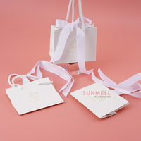 Mini sac cadeau commercial en papier rose de luxe pour la Saint-Valentin feuille chaude Logo estampé à chaud pour montres lunettes impression offset