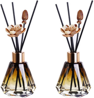 Bouteilles en verre délicates de diffuseur de roseau de décor de feuille d'or avec 20pcs bâtons de diffuseur de roseau et couvercles pour la salle de bain à la maison
