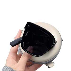 Nouvelles lunettes de soleil pliables pour femmes, monture noire en PC, verres polarisés UV400, pour la conduite, avec étui de protection - Product Image 1