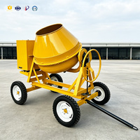 Bétonnière électrique haute performance 500L avec trémie de chargement pour travaux professionnels de mélange de sable et de ciment sur les chantiers de construction