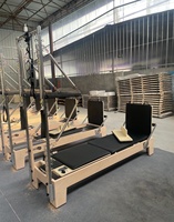 Reformers de Pilates couleur personnalisée, Table Trapèze pour le remodelage corporel, avec ressorts à câble de qualité allemande, Cadillac de Pilates pour usage en studio de Pilates