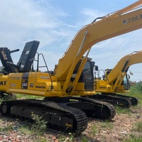 Excavadora de cadenas usada KOMATSU PC240LC con línea de martillos auxiliares completa y bajo mantenimiento para tareas de rompe roca ligera y limpieza de terrenos