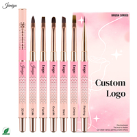 Ensemble de pinceaux à ongles en métal rose avec logo personnalisé découpé, manche creux, poils en nylon pour l'application de vernis gel et la création de motifs d'art sur les ongles