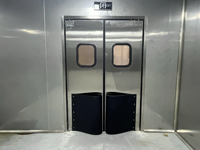 Porte battante à cadre en acier inoxydable, résistante aux chocs, ouverture bidirectionnelle pour accès intérieur d'atelier industriel
