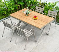 Ensemble de mobilier de salle à manger d'extérieur moderne en acier au carbone et alliage d'aluminium, avec coussins durables et imperméables, table et chaises pour parc et cour.