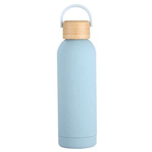 Minimalist Stainless Steel Vacuum Insulated Water Bottle with Wooden Lid and Handle for Travel - Product Image 4
