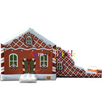 Vente de toboggan et trampoline gonflables d'extérieur sur le thème de Noël en PVC. Taille personnalisable disponible.
