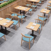Ensemble table et chaises de luxe modernes en bois massif et en cuir pour usage domestique et commercial pour meubles de café de centre commercial