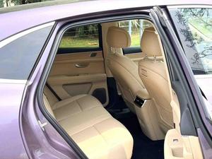 AITO M5 Extended-Range Ultra SUV 4x4 Usato 2025 viola su sfondo albicocca - Product Image 5