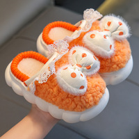Nouveaux produits pantoufles d'hiver pour filles conception d'arc chaussures en peluche de coton pour enfants pantoufles en coton épaissi pour enfants