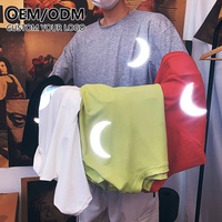 Nouvelle tendance mode impression réfléchissante hommes T-shirt ample col rond impression par transfert de chaleur coloré réflexion logo T-shirt