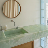 Dalle de marbre vert onyx pierre naturelle translucide de luxe personnalisée pour îlot de cuisine comptoir de salle de bain vanité panneau mural rétro-éclairé