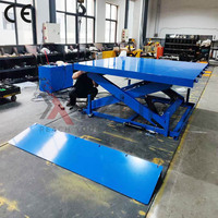 Plateforme élévatrice à ciseaux fixe EN1570 |   Plateforme XYZlift pour les applications de tri de colis et de marchandises