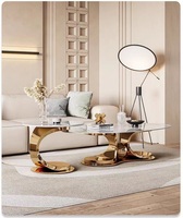Table basse ovale moderne de luxe léger avec base en acier inoxydable pour la maison, table d'appoint simple pour le salon d'un appartement