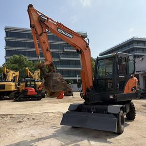 DOOSAN DX60W Radbagger 6 Tonnen Betriebsgewicht 0,18m Schaufelkapazität - Product Image 1