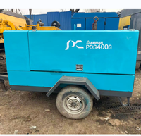 Compresseur d'air rotatif à double vis d'occasion japonais Airman PDS 400 S, 11m³/min, 400cfm, 7 bars, avec moteur Isuzu V3800, 81 kW