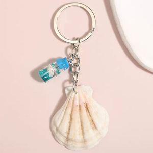 พวงกุญแจอะคริลิคใสลายปลาดาวในขวดลอยน้ำ - Product Image 4
