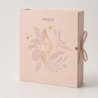 Boîte cadeau magnétique de luxe personnalisée rose style livre 12 jours avec ruban pour cosmétiques, bijoux, soins de la peau, calendrier de l'avent beauté