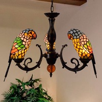 Suspension LED émaillée d'art rétro européen Lustre d'oiseau de salon de restaurant de bar créatif avec la conception de perroquet