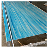 Pierre d'albâtre bleu rétro-éclairé Onyx translucide pour hôtel commercial mur et comptoir de bar tablette haut en gros